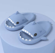 Cartoon shark slippers for adults, soft and cute design, perfect for indoor or outdoor wear.