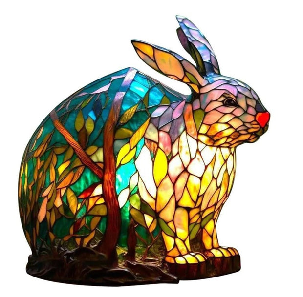 Stained glass rabbit lamp with multicolored design on a white background