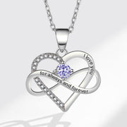 Silver heart-shaped necklace with a purple gemstone on a white background