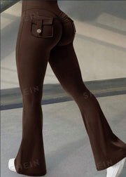 Brown bell-bottom pants on a neutral background