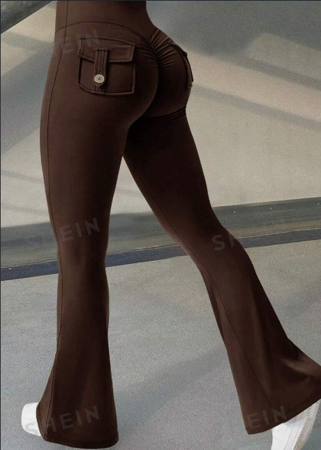 Brown bell-bottom pants on a neutral background