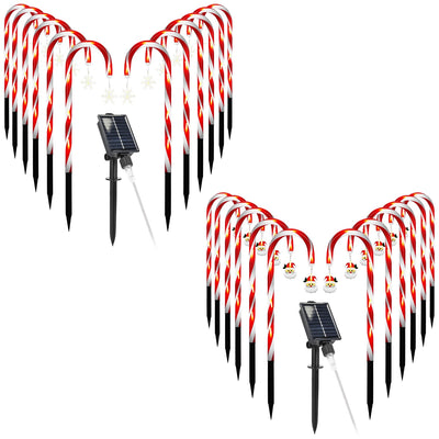 Solar-powered candy cane lights on white background