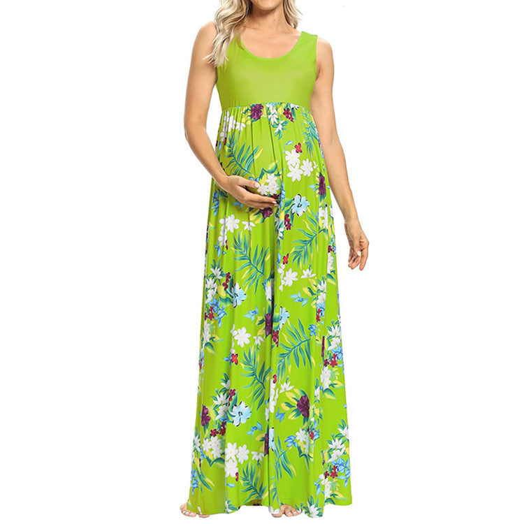 Woman wearing a green floral dress on a white background