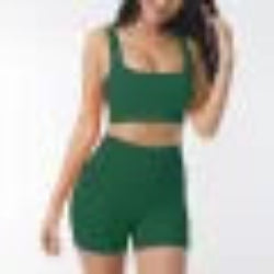 Green shorts with a matching top on a plain background