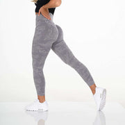 Brand Name gray yoga leggings showcasing comfort and flexibility, perfect for workouts and casual wear.