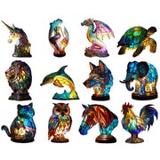 Collection of colorful animal-themed lamps on a white background