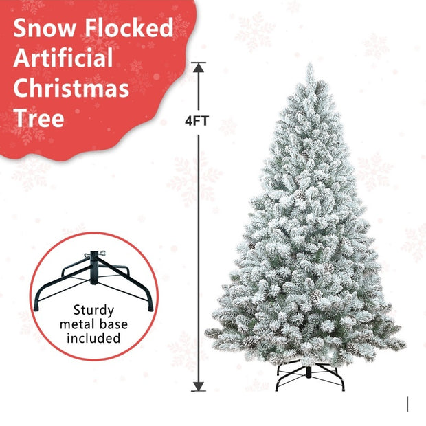 Snow-flocked artificial Christmas tree with a sturdy metal base, labeled as 4FT.