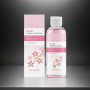 Jaysuing Cherry Blossoms toner bottle and packaging on a black and grey background